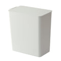 Japanese-style desktop trash can with flip lid, creative mini wastepaper basket for home use in the bedroom